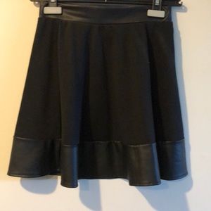 Black knit mini skirt